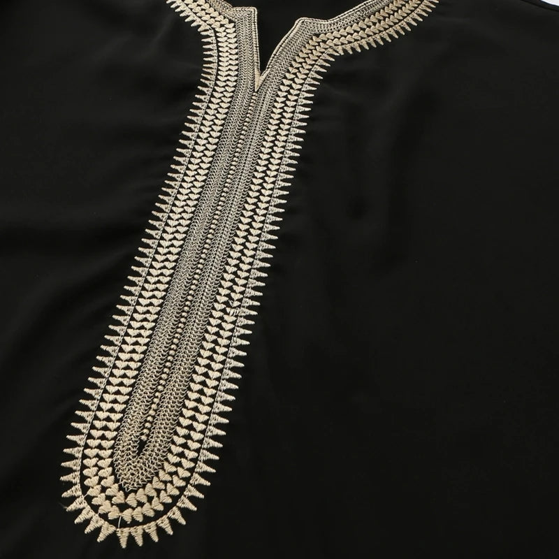 **Title:**  
Men's Long Sleeve Neck Middle Kaftan Thobe - Ethnic Gown
**Description:**  
This elegant men's kaftan thobe features a neck middle design and long sleeves, offering a sophisticated take on ethnic clothing. Perfe