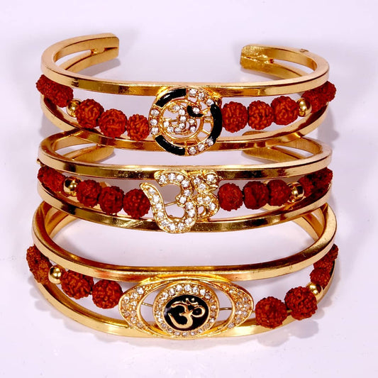 This is a description of a product called Om bracelets. They are unisex bracelets made with Rudraksha beads, crystals, and mixed metals. The bracelets are a stylish accessory that can complement any outfit. The Om symbol on the bracelets carries spiritual significance and can help wearers stay grounded and connected.