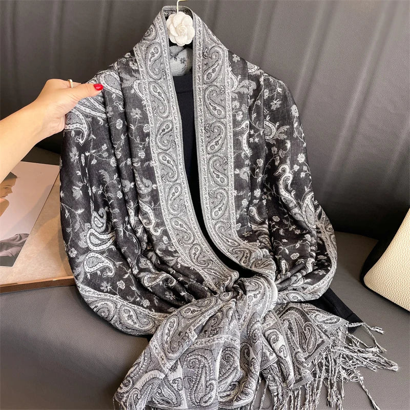 Luxury Cashmere Pashmina Shawl  

**Description:**  
Elevate your autumn wardrobe with this luxury cashmere pashmina shawl. Designed for warmth and style, this elegant wrap features a chic print, making it the perfect accesso